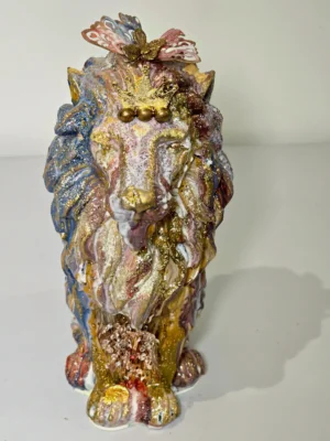 Ornamental decorated Lion with crown and butterflies