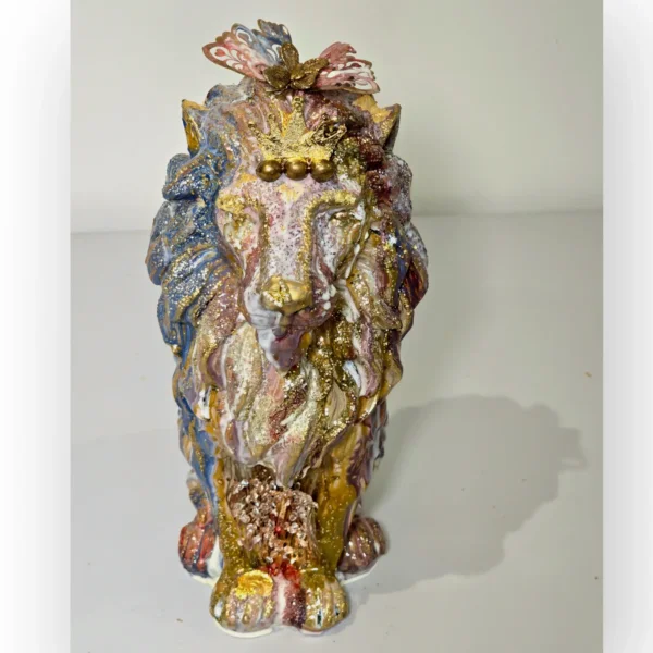 Ornamental decorated Lion with crown and butterflies